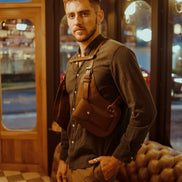 Model standing wearing the Lashasana brown vegan cactus leather holster